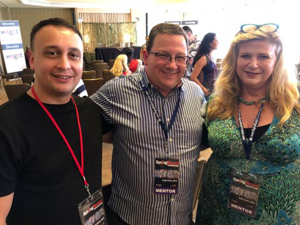 Michael Darius Eastwood at the Springboard conference in the United States beside Kevin Jonas Senior and Vicky Hamilton, both wearing mentor lanyards